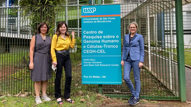 The three representatives of the partner universities in front of the largest center for human genome and stem cell research in South America 