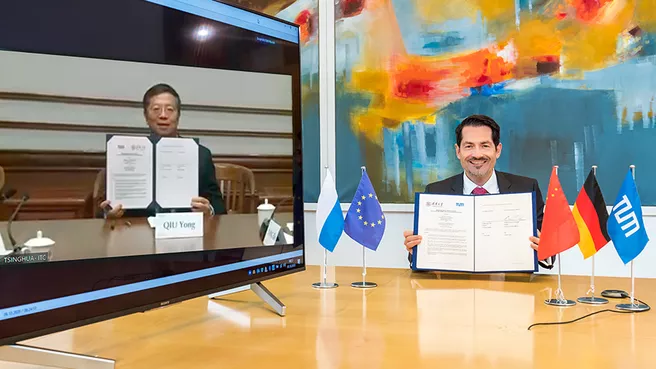 The presidents Prof. Thomas F. Hofmann and Prof. Qiu Yong sign the new partnership agreement during a video conference.