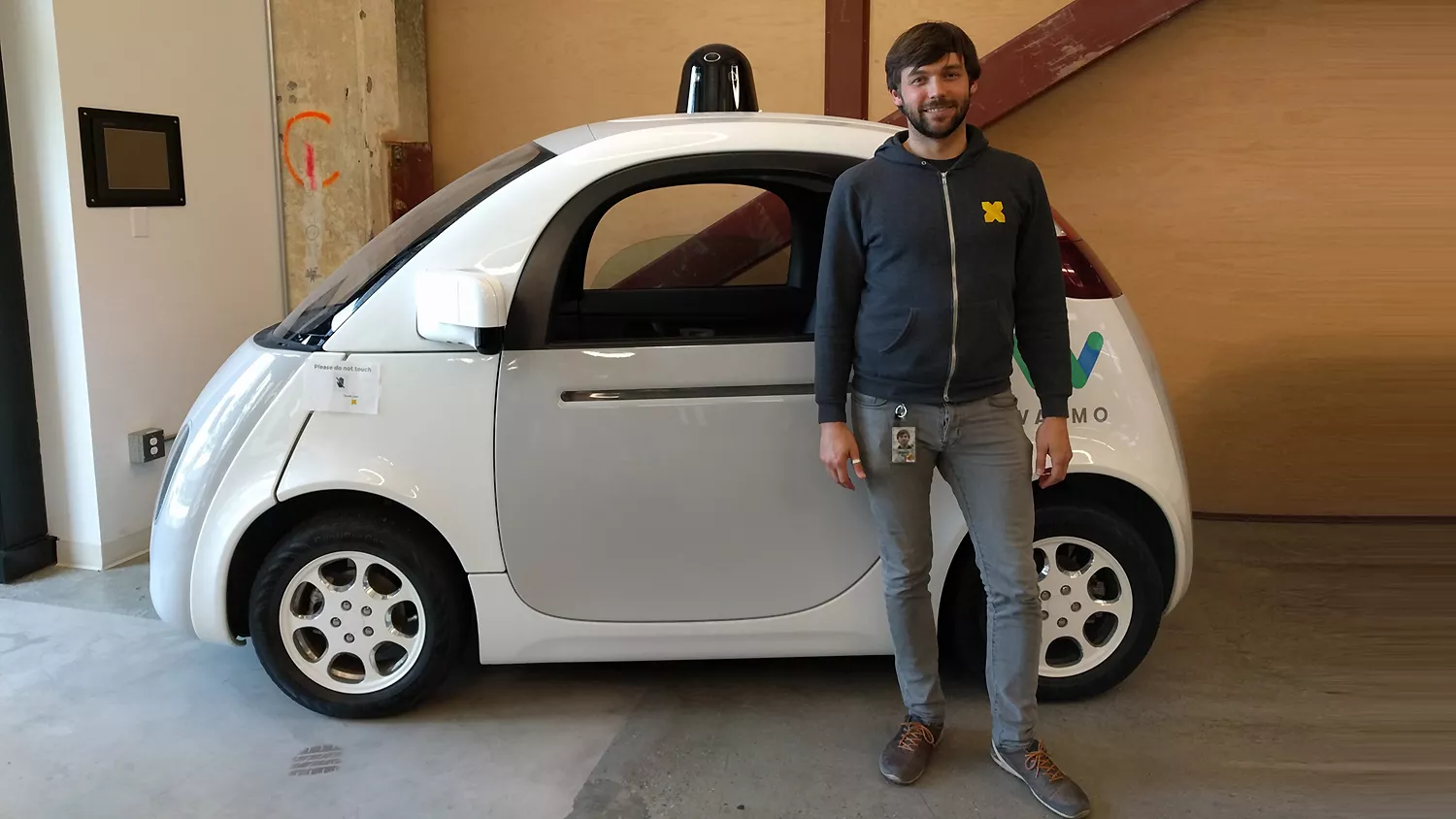Elmar Mair in front of a Google car