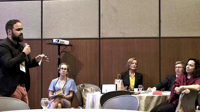 TUM Liaison Officer Sören Metz speaks at FAUBAI panel