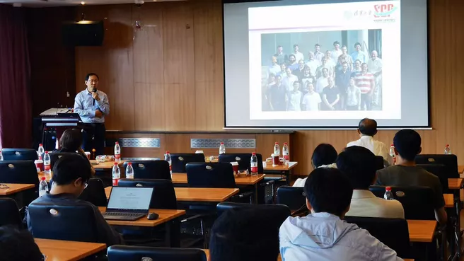 Prof. Wang Bing gives his talk in a lecture hall