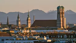 Munich: Church of Our Lady in front of mountain panorama