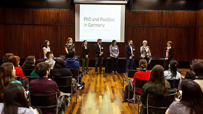 Group picture of the organizers in the lecture hall