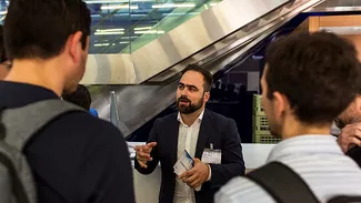 Candidates in conversation with liaison officer Sören Metz