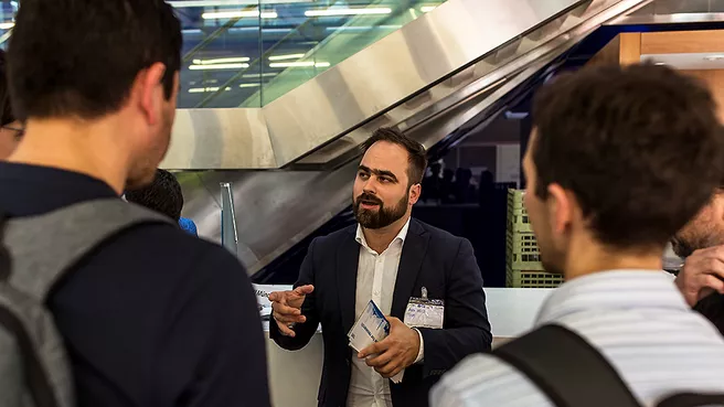 Candidates in conversation with liaison officer Sören Metz