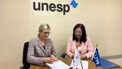 The representatives of the two partner universities at the signing of the contract in Sao Paulo 