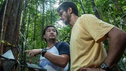 David Lapola with a co-worker in the rainforest