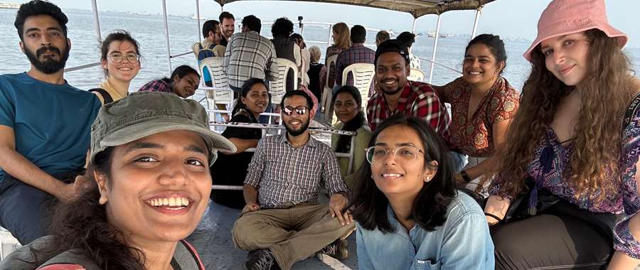 Group selfie of the participants during a boat trip