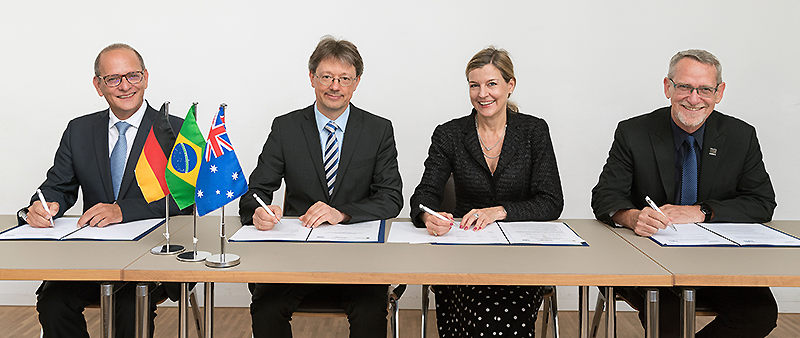 The university representatives at the signing of the contract