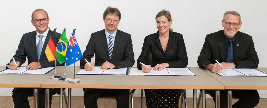 The university representatives at the signing of the contract